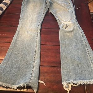 Distressed flare jeans